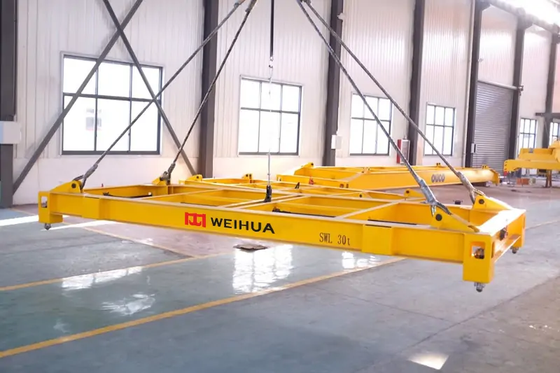 Electric fixed container spreader